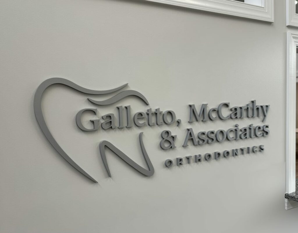 Galletto, McCarthy & associates logo on wall