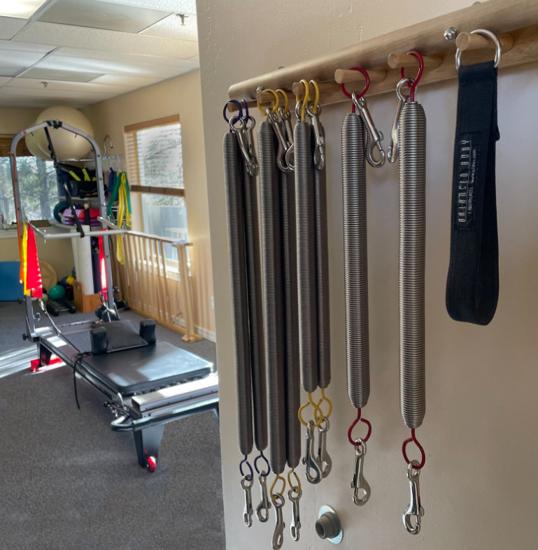 fitness equipemnt with hanging springs